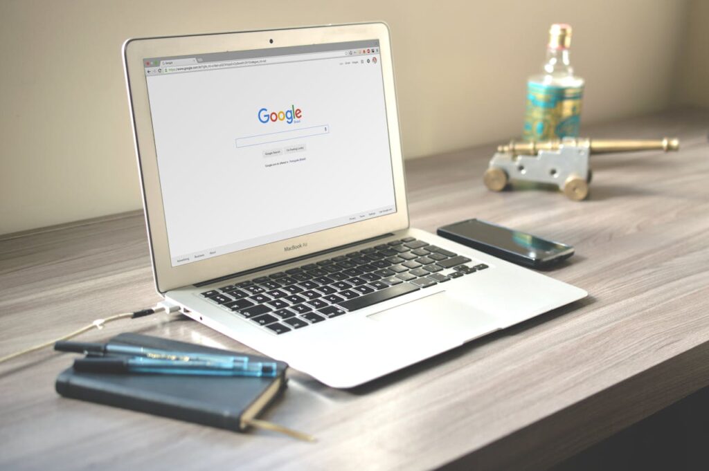 pexels-photo-67112 Macbook Air on Grey Wooden Table